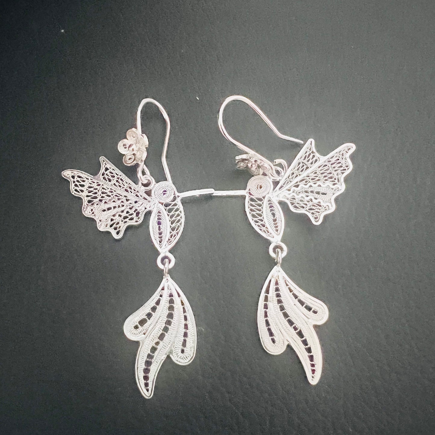 Large hummingbird earrings in silver, handmade in Ecuador